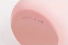 UVレーザーマーカーLinx UVG5　カラー容器の底への印字例
